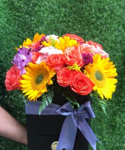 Bouquet 25 rosas con girasoles base de madera
